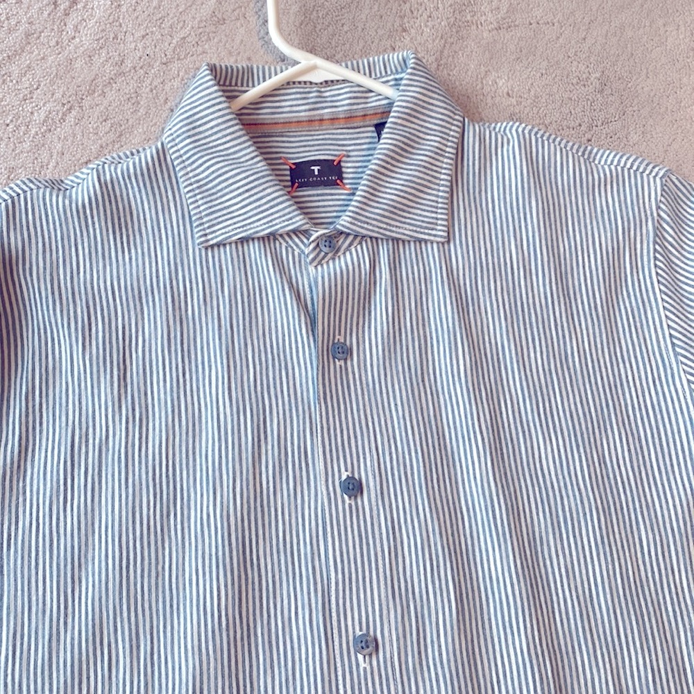 Left Coast Tee short sleeve blue/white striped button down collared shirt.